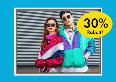 ORWO Leinwandbild mit Rahmen und stylischem Paar vor grauem Hintergrund; 30% Rabatt auf deine Leinwand.