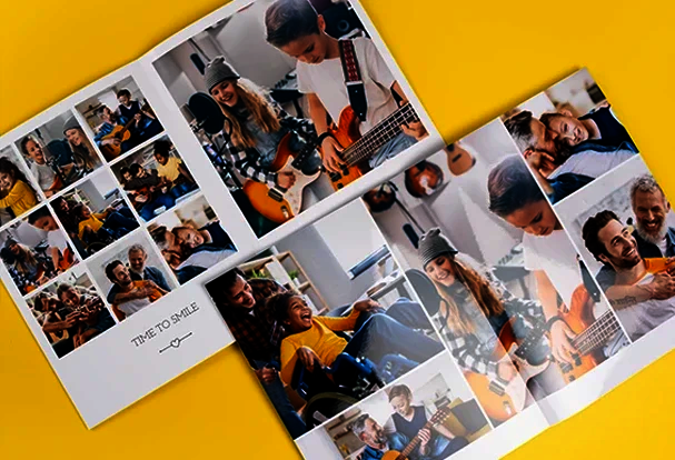 Aufgeschlagenes Fotojahrbuchbuch mit vielen Momentaufnahmen von gemeinsamen Erlebnissen im modernen Layout