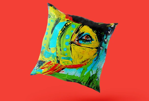 Farbenfrohes ORWO Fotokissen mit abstraktem Kinderbild in leuchtenden Gelb-, Blau- und Grüntönen – kreative Geschenkidee passend zu einem Kalender mit Kinderbildern