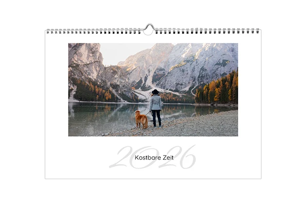 Fotoprodukte Fotokalender mit Monatsübersicht und persönlichem Foto eines Paares im Winter, individuell gestaltet für das ganze Jahr.