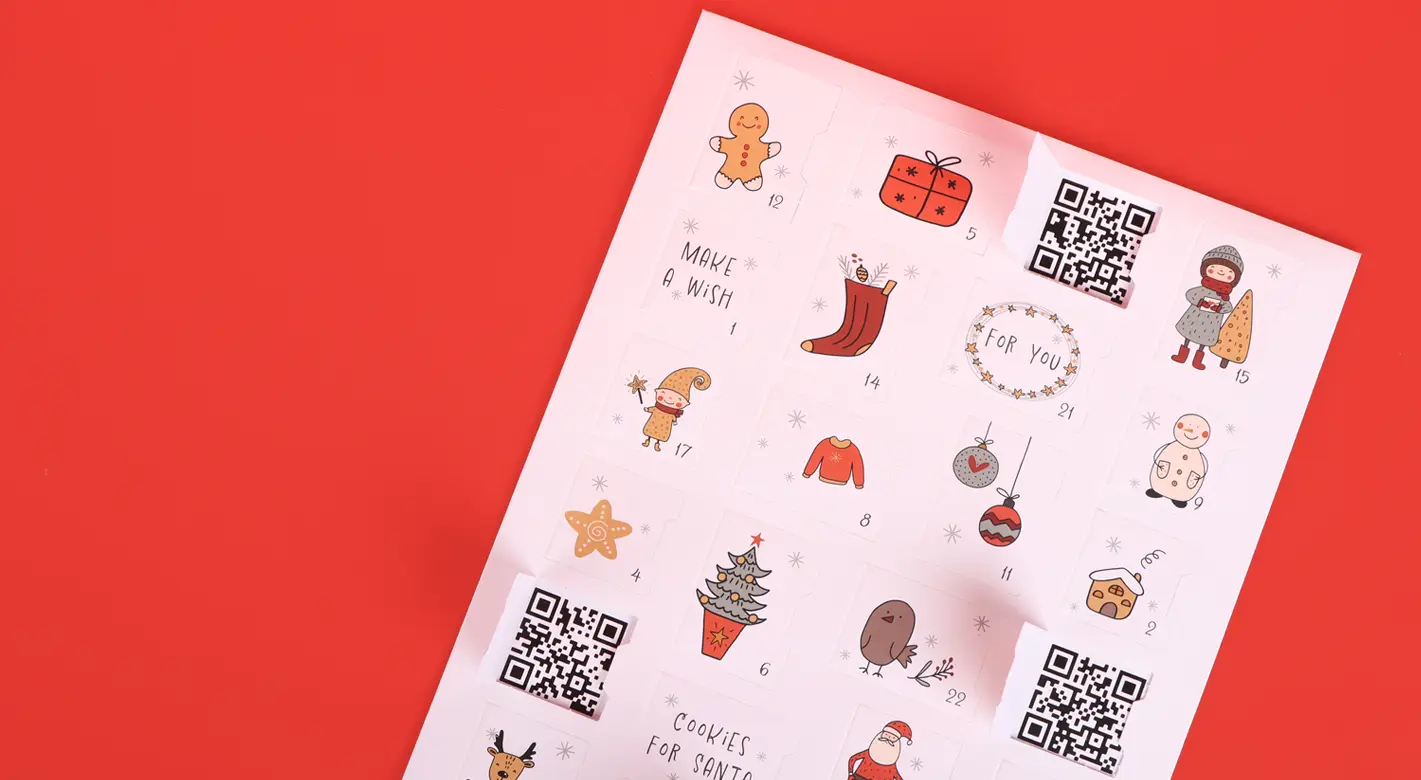 QR-Code Adventskalender für interaktive Überraschungen Wir zeigen dir, wie du einen QR-Code Adventskalender ganz einfach selber machen kannst.