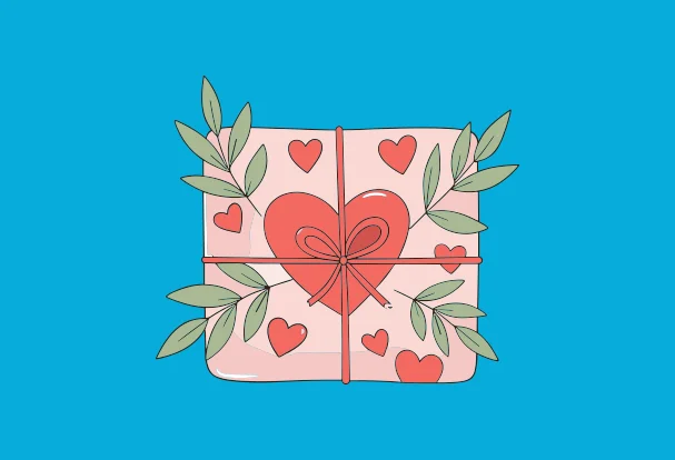 Kreatives Fotogeschenk zum Muttertag Liebevoll verpacktes Geschenk mit Herzmotiv und floralen Elementen als kreative Idee für ein persönliches Fotogeschenk zum Muttertag