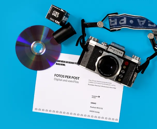 Klassische Fotokamera mit Film, CD und Versandtasche von ORWO – entdecke jetzt mehr Produkte.